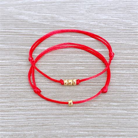 red string bracelet for protection